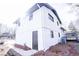 Side view of the house showcasing the garage and additional exterior features at 2688 Heritage Ln, Morrow, GA 30260