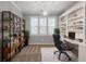 Home office with built-in shelving and window at 3036 Lassiter Rd, Marietta, GA 30062