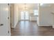 Dining area with hardwood floors and french doors leading to the backyard at 664 Tarragon Sw Way, Atlanta, GA 30331