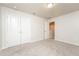 Well-lit bedroom with double doors leading to a closet at 1267 Sunny Lake Dr, Lawrenceville, GA 30043