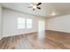 Bright living room with hardwood floors and neutral walls at 1267 Sunny Lake Dr, Lawrenceville, GA 30043