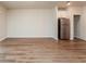 Spacious living room with wood-look floors and a kitchen at 1267 Sunny Lake Dr, Lawrenceville, GA 30043