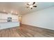 Open living area with hardwood floors and island kitchen at 1267 Sunny Lake Dr, Lawrenceville, GA 30043