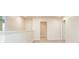 Loft area with neutral carpeting and hallway access at 1267 Sunny Lake Dr, Lawrenceville, GA 30043