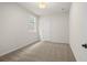 Spacious bedroom with neutral carpet and ample natural light at 1682 Juniper Berry Way, Loganville, GA 30052