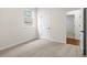 Bright bedroom featuring neutral walls and carpet flooring at 1682 Juniper Berry Way, Loganville, GA 30052