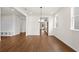 Open concept dining room with hardwood floors and kitchen access at 1682 Juniper Berry Way, Loganville, GA 30052