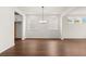 Elegant dining room with hardwood floors and a chandelier at 1682 Juniper Berry Way, Loganville, GA 30052