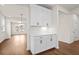 White kitchen cabinets and a built-in buffet at 1682 Juniper Berry Way, Loganville, GA 30052