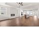 Open concept living room and kitchen with hardwood floors at 1682 Juniper Berry Way, Loganville, GA 30052