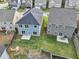 Aerial view of two houses with fenced backyards at 1862 Weatherbrook Cir, Lawrenceville, GA 30043