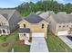 Aerial view of a two-story house with a large yard at 1862 Weatherbrook Cir, Lawrenceville, GA 30043