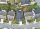 Aerial view of houses in a residential neighborhood at 1862 Weatherbrook Cir, Lawrenceville, GA 30043