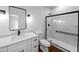 Modern bathroom with white vanity and frameless shower at 1862 Weatherbrook Cir, Lawrenceville, GA 30043