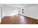 Bright bedroom with hardwood floors and neutral walls at 1862 Weatherbrook Cir, Lawrenceville, GA 30043