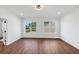 Spacious bedroom with wood floors and large windows at 1862 Weatherbrook Cir, Lawrenceville, GA 30043