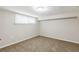 Finished basement room with neutral walls and window at 3164 Delmar Nw Ln, Atlanta, GA 30311