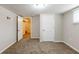 Finished basement room with carpet and doors at 3164 Delmar Nw Ln, Atlanta, GA 30311