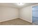 Finished basement room with neutral walls and carpet at 3164 Delmar Nw Ln, Atlanta, GA 30311