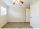 Bedroom with neutral walls, brown carpet, and ceiling fan at 3164 Delmar Nw Ln, Atlanta, GA 30311