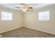 Bedroom with neutral walls, brown carpet, and ceiling fan at 3164 Delmar Nw Ln, Atlanta, GA 30311