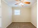 Bedroom with neutral walls, brown carpet, and ceiling fan at 3164 Delmar Nw Ln, Atlanta, GA 30311