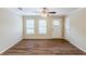 Living room with wood-look floors and ceiling fan at 3164 Delmar Nw Ln, Atlanta, GA 30311