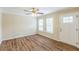 Living room with wood-look floors and ceiling fan at 3164 Delmar Nw Ln, Atlanta, GA 30311