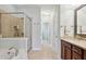 Spa-like bathroom with soaking tub, walk-in shower, and double vanity at 2631 Portbury Ne Pl, Atlanta, GA 30329