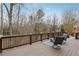 Relaxing deck overlooking wooded area with two chairs and a rug at 4113 Gold Mill Rdg, Canton, GA 30114