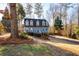 Two-story house with blue siding, dormer windows, and landscaped yard at 1227 Independence Way, Marietta, GA 30062