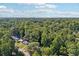Aerial view of neighborhood surrounded by a large forest at 1626 Kenmore Sw St, Atlanta, GA 30311