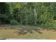 Spacious backyard bordering a wooded area, offering a private setting at 1626 Kenmore Sw St, Atlanta, GA 30311