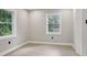 Spacious bedroom with hardwood floors and closet at 1626 Kenmore Sw St, Atlanta, GA 30311