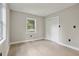 Well-lit bedroom with hardwood floors and closet at 1626 Kenmore Sw St, Atlanta, GA 30311