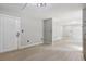 Bright dining area with hardwood floors and access to kitchen at 1626 Kenmore Sw St, Atlanta, GA 30311