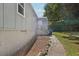Gray house exterior with steps leading to the entrance and a small yard at 1626 Kenmore Sw St, Atlanta, GA 30311
