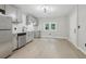 Modern kitchen with gray cabinets, quartz countertops, and stainless steel appliances at 1626 Kenmore Sw St, Atlanta, GA 30311