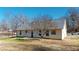 House's back exterior with patio and fenced yard at 4002 Cheoah Dr, Douglasville, GA 30135