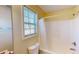 Clean bathroom with a shower/tub combo and a window at 4002 Cheoah Dr, Douglasville, GA 30135