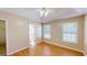 Bright bedroom with hardwood floors and access to a private bathroom at 4002 Cheoah Dr, Douglasville, GA 30135