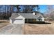 House exterior features a single story home with a garage at 4002 Cheoah Dr, Douglasville, GA 30135