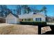 One-story house with attached garage and manicured lawn at 4002 Cheoah Dr, Douglasville, GA 30135