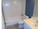 Clean bathroom with a white tub, toilet, and vanity at 43 Le Parc Fontaine, Lithonia, GA 30038