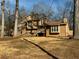 Two-story house with wood siding and deck at 782 Post Road Way, Stone Mountain, GA 30088