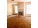 Spacious living room featuring a fireplace and large windows at 79 Place Fontaine, Lithonia, GA 30038