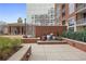 Upscale courtyard with brickwork, fountain, and seating at 1820 Peachtree Nw St # 303, Atlanta, GA 30309