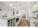 Modern kitchen with wine storage and stainless steel appliances at 1820 Peachtree Nw St # 303, Atlanta, GA 30309