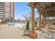 Relaxing pool area with pergola and seating at 1820 Peachtree Nw St # 303, Atlanta, GA 30309