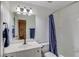 Simple bathroom with tub shower combo and vanity at 3640 Rolling Creek Dr, Buford, GA 30519